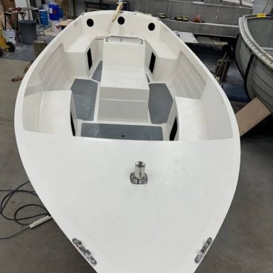 Aquasea launch interior viewed from the bow, showing seating and centre console